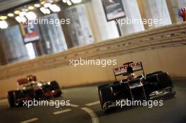 Pastor Maldonado (VEN) Williams FW34 leads Lewis Hamilton (GBR) McLaren MP4/27. 26.05.2012. Formula 1 World Championship, Rd 6, Monaco Grand Prix, Monte Carlo, Monaco, Qualifying Day