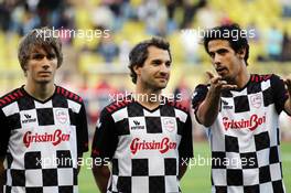 (L to R): Charles Pic (FRA) Marussia F1 Team with Timo Glock (GER) Marussia F1 Team and Lucas di Grassi (BRA) at the charity football match. 22.05.2012. Formula 1 World Championship, Rd 6, Monaco Grand Prix, Monte Carlo, Monaco, Tuesday Soccer