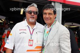 (L to R): Dr. Vijay Mallya (IND) Sahara Force India F1 Team Owner with Antonio Banderas (ESP) Actor. 27.05.2012. Formula 1 World Championship, Rd 6, Monaco Grand Prix, Monte Carlo, Monaco, Race Day