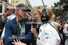 Ron Howard (USA) with Jenny Gow (GBR) BBC Radio 5 Live Pitlane Reporter on the grid. 27.05.2012. Formula 1 World Championship, Rd 6, Monaco Grand Prix, Monte Carlo, Monaco, Race Day