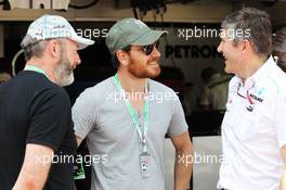 (L to R): Liam Cunningham (IRE) Actor and Michael Fassbender (IRE) Actor with Nick Fry (GBR) Mercedes AMG F1 Chief Executive Officer. 26.05.2012. Formula 1 World Championship, Rd 6, Monaco Grand Prix, Monte Carlo, Monaco, Qualifying Day