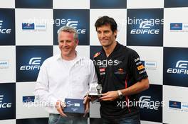 Mark Webber (AUS) Red Bull Racing (Right) with Kai-Christian Helms (GER) Casio European Marketing Manager and the Casio Edifice EFR-520RB Red Bull Racing Limited Edition watch  23.05.2012. Formula 1 World Championship, Rd 6, Monaco Grand Prix, Monte Carlo, Monaco, Preparation Day