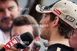 Romain Grosjean (FRA) Lotus F1 Team with the media. 23.05.2012. Formula 1 World Championship, Rd 6, Monaco Grand Prix, Monte Carlo, Monaco, Preparation Day