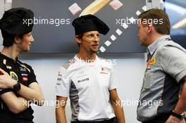 (L to R): Romain Grosjean (FRA) Lotus F1 Team; Jenson Button (GBR) McLaren; and Paul Hembery (GBR) Pirelli Motorsport Director at a Pirelli cooking competition. 23.05.2012. Formula 1 World Championship, Rd 6, Monaco Grand Prix, Monte Carlo, Monaco, Preparation Day