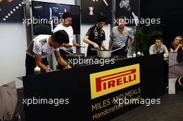 (L to R): Jenson Button (GBR) McLaren; Romain Grosjean (FRA) Lotus F1 Team and Paul Hembery (GBR) Pirelli Motorsport Director at a Pirelli cooking competition. 23.05.2012. Formula 1 World Championship, Rd 6, Monaco Grand Prix, Monte Carlo, Monaco, Preparation Day
