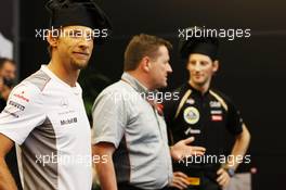 (L to R): Jenson Button (GBR) McLaren; Paul Hembery (GBR) Pirelli Motorsport Director and Romain Grosjean (FRA) Lotus F1 Team at a Pirelli cooking competition. 23.05.2012. Formula 1 World Championship, Rd 6, Monaco Grand Prix, Monte Carlo, Monaco, Preparation Day