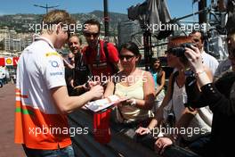 Nico Hulkenberg (GER) Sahara Force India F1 signs autographs for the fans. 23.05.2012. Formula 1 World Championship, Rd 6, Monaco Grand Prix, Monte Carlo, Monaco, Preparation Day