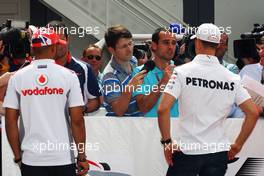 Lewis Hamilton (GBR) McLaren and Michael Schumacher (GER) Mercedes AMG F1. 23.05.2012. Formula 1 World Championship, Rd 6, Monaco Grand Prix, Monte Carlo, Monaco, Preparation Day