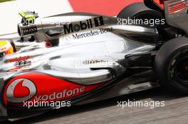 McLaren MP4/27 exhaust detail. 23.03.2012. Formula 1 World Championship, Rd 2, Malaysian Grand Prix, Sepang, Malaysia, Friday Practice