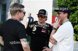 (L to R): Mika Salo (FIN) with Kimi Raikkonen (FIN) Lotus F1 Team. 23.03.2012. Formula 1 World Championship, Rd 2, Malaysian Grand Prix, Sepang, Malaysia, Friday
