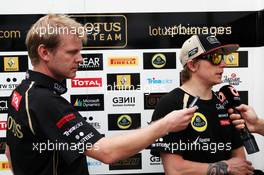 (L to R): Andy Stobart (GBR) Lotus F1 Team Press Officer with Kimi Raikkonen (FIN) Lotus F1 Team. 23.03.2012. Formula 1 World Championship, Rd 2, Malaysian Grand Prix, Sepang, Malaysia, Friday Practice