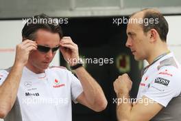 (L to R): Sam Michael (AUS) McLaren Sporting Director with Phil Prew (GBR) McLaren Race Engineer. 23.03.2012. Formula 1 World Championship, Rd 2, Malaysian Grand Prix, Sepang, Malaysia, Friday