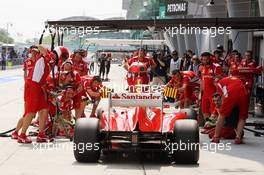 Fernando Alonso (ESP) Ferrari F2012 makes a pit stop. 23.03.2012. Formula 1 World Championship, Rd 2, Malaysian Grand Prix, Sepang, Malaysia, Friday Practice