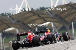 Mark Webber (AUS) Red Bull Racing RB8 leads Jean-Eric Vergne (FRA) Scuderia Toro Rosso STR7. 23.03.2012. Formula 1 World Championship, Rd 2, Malaysian Grand Prix, Sepang, Malaysia, Friday Practice