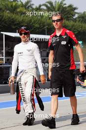 Timo Glock (GER) Marussia F1 Team (Left). 23.03.2012. Formula 1 World Championship, Rd 2, Malaysian Grand Prix, Sepang, Malaysia, Friday Practice