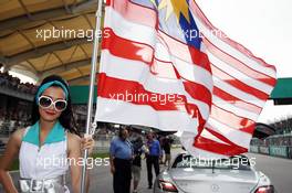 Grid girl. 25.03.2012. Formula 1 World Championship, Rd 2, Malaysian Grand Prix, Sepang, Malaysia, Sunday Grid Girl