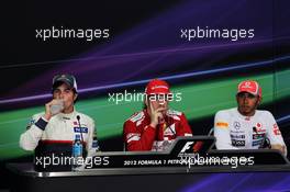 (L to R): Sergio Perez (MEX) Sauber with Fernando Alonso (ESP) Ferrari and Lewis Hamilton (GBR) McLaren in the FIA Press Conference. 25.03.2012. Formula 1 World Championship, Rd 2, Malaysian Grand Prix, Sepang, Malaysia, Sunday Podium