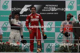 2nd place Sergio Perez (MEX), Sauber F1 Team and 1st place Fernando Alonso (ESP), Scuderia Ferrari and 3rd place Lewis Hamilton (GBR), McLaren Mercedes  25.03.2012. Formula 1 World Championship, Rd 2, Malaysian Grand Prix, Sepang, Malaysia, Sunday Podium