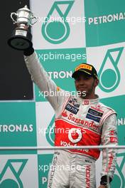 Lewis Hamilton (GBR), McLaren Mercedes  25.03.2012. Formula 1 World Championship, Rd 2, Malaysian Grand Prix, Sepang, Malaysia, Sunday Podium