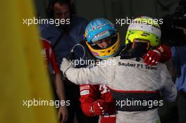 Fernando Alonso (ESP), Scuderia Ferrari and Sergio Perez (MEX), Sauber F1 Team  25.03.2012. Formula 1 World Championship, Rd 2, Malaysian Grand Prix, Sepang, Malaysia, Sunday Podium