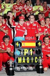 Race winner Fernando Alonso (ESP) Ferrari celebrates with Stefano Domenicali (ITA) Ferrari General Director and the team. 25.03.2012. Formula 1 World Championship, Rd 2, Malaysian Grand Prix, Sepang, Malaysia, Sunday Podium
