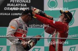 Lewis Hamilton (GBR), McLaren Mercedes and Fernando Alonso (ESP), Scuderia Ferrari  25.03.2012. Formula 1 World Championship, Rd 2, Malaysian Grand Prix, Sepang, Malaysia, Sunday Podium