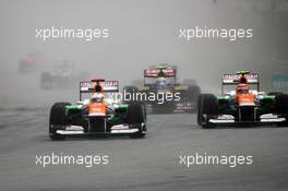 (L to R): Paul di Resta (GBR) Sahara Force India VJM05 and team mate Nico Hulkenberg (GER) Sahara Force India F1 VJM05. 25.03.2012. Formula 1 World Championship, Rd 2, Malaysian Grand Prix, Sepang, Malaysia, Sunday Race