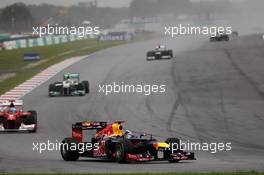 Sebastian Vettel (GER) Red Bull Racing RB8 leads Fernando Alonso (ESP) Ferrari F2012. 25.03.2012. Formula 1 World Championship, Rd 2, Malaysian Grand Prix, Sepang, Malaysia, Sunday Race