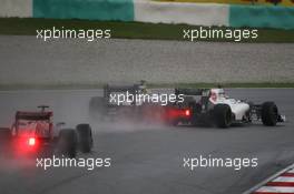 Bruno Senna (BRA), Williams F1 Team and Kamui Kobayashi (JAP), Sauber F1 Team  25.03.2012. Formula 1 World Championship, Rd 2, Malaysian Grand Prix, Sepang, Malaysia, Sunday Race