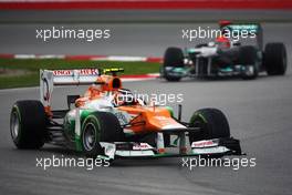 Nico Hulkenberg (GER) Sahara Force India F1 VJM05 leads Michael Schumacher (GER) Mercedes AMG F1 W03. 25.03.2012. Formula 1 World Championship, Rd 2, Malaysian Grand Prix, Sepang, Malaysia, Sunday Race