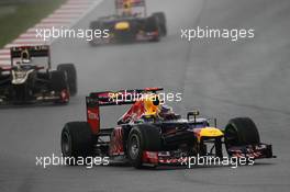Sebastian Vettel (GER), Red Bull Racing leads Kimi Raikkonen, Lotus Renault F1 Team  25.03.2012. Formula 1 World Championship, Rd 2, Malaysian Grand Prix, Sepang, Malaysia, Sunday Race