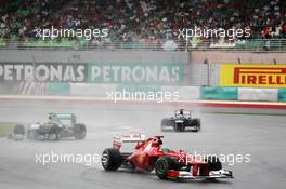 Fernando Alonso (ESP) Ferrari F2012 leads Nico Rosberg (GER) Mercedes AMG F1 W03. 25.03.2012. Formula 1 World Championship, Rd 2, Malaysian Grand Prix, Sepang, Malaysia, Sunday Race