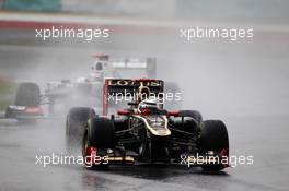 Kimi Raikkonen (FIN) Lotus E20 leads Kamui Kobayashi (JPN) Sauber C31. 25.03.2012. Formula 1 World Championship, Rd 2, Malaysian Grand Prix, Sepang, Malaysia, Sunday Race