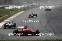 Fernando Alonso (ESP) Ferrari F2012 leads Nico Rosberg (GER) Mercedes AMG F1 W03. 25.03.2012. Formula 1 World Championship, Rd 2, Malaysian Grand Prix, Sepang, Malaysia, Sunday Race