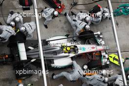 Nico Rosberg (GER) Mercedes AMG F1 W03 makes a pit stop. 25.03.2012. Formula 1 World Championship, Rd 2, Malaysian Grand Prix, Sepang, Malaysia, Sunday Race