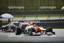 Nico Hulkenberg (GER) Sahara Force India F1 VJM05 leads Kamui Kobayashi (JPN) Sauber C31. 25.03.2012. Formula 1 World Championship, Rd 2, Malaysian Grand Prix, Sepang, Malaysia, Sunday Race