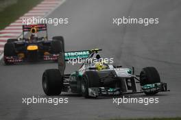 Nico Rosberg (GER), Mercedes AMG Petronas leads Sebastian Vettel (GER), Red Bull Racing  25.03.2012. Formula 1 World Championship, Rd 2, Malaysian Grand Prix, Sepang, Malaysia, Sunday Race