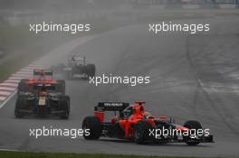 Timo Glock (GER), Marussia F1 Team leads Heikki Kovalainen (FIN), Caterham F1 Team  25.03.2012. Formula 1 World Championship, Rd 2, Malaysian Grand Prix, Sepang, Malaysia, Sunday Race