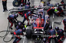 Daniel Ricciardo (AUS) Scuderia Toro Rosso STR7 makes a pit stop. 25.03.2012. Formula 1 World Championship, Rd 2, Malaysian Grand Prix, Sepang, Malaysia, Sunday Race