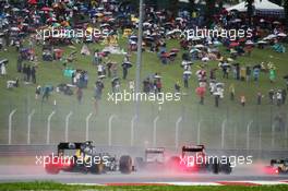 Vitaly Petrov (RUS) Caterham CT01. 25.03.2012. Formula 1 World Championship, Rd 2, Malaysian Grand Prix, Sepang, Malaysia, Sunday Race