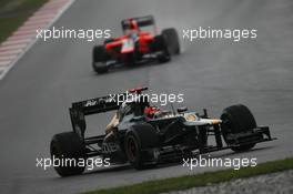 Heikki Kovalainen (FIN), Caterham F1 Team leads Timo Glock (GER), Marussia F1 Team  25.03.2012. Formula 1 World Championship, Rd 2, Malaysian Grand Prix, Sepang, Malaysia, Sunday Race
