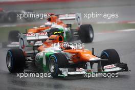 Nico Hulkenberg (GER) Sahara Force India F1 VJM05 leads Paul di Resta (GBR) Sahara Force India VJM05. 25.03.2012. Formula 1 World Championship, Rd 2, Malaysian Grand Prix, Sepang, Malaysia, Sunday Race