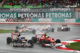 (L to R): Daniel Ricciardo (AUS) Scuderia Toro Rosso STR7 leads Felipe Massa (BRA) Ferrari F2012. 25.03.2012. Formula 1 World Championship, Rd 2, Malaysian Grand Prix, Sepang, Malaysia, Sunday Race