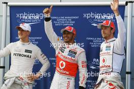 (L to R): Michael Schumacher (GER) Mercedes AMG F1 celebrates his second position in parc ferme with pole sitter Lewis Hamilton (GBR) McLaren and third placed Jenson Button (GBR) McLaren. 24.03.2012. Formula 1 World Championship, Rd 2, Malaysian Grand Prix, Sepang, Malaysia, Saturday Qualifying