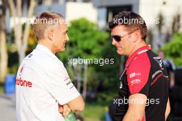 (L to R): Martin Whitmarsh (GBR) McLaren Chief Executive Officer with Graeme Lowdon (GBR) President of Marussia Racing. 24.03.2012. Formula 1 World Championship, Rd 2, Malaysian Grand Prix, Sepang, Malaysia, Saturday