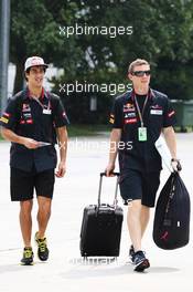 Daniel Ricciardo (AUS) Scuderia Toro Rosso (Left). 24.03.2012. Formula 1 World Championship, Rd 2, Malaysian Grand Prix, Sepang, Malaysia, Saturday