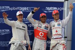 Qualifying results (L-R) 3rd Michael Schumacher (GER), Mercedes AMG Petronas, pole position man 1st Lewis Hamilton (GBR), McLaren Mercedes and 2nd place Jenson Button (GBR), McLaren Mercedes  24.03.2012. Formula 1 World Championship, Rd 2, Malaysian Grand Prix, Sepang, Malaysia, Saturday Qualifying