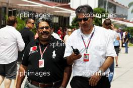 (L to R): Muhammed Al Khalifa (BRN) Bahrain Circuit Chairman with Pasquale Lattuneddu (ITA) of the FOM. 24.03.2012. Formula 1 World Championship, Rd 2, Malaysian Grand Prix, Sepang, Malaysia, Saturday