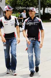 (L to R): Bruno Senna (BRA) Williams with Pastor Maldonado (VEN) Williams. 25.03.2012. Formula 1 World Championship, Rd 2, Malaysian Grand Prix, Sepang, Malaysia, Sunday