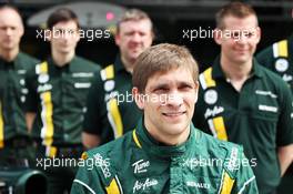 Vitaly Petrov (RUS) Caterham at a team photograph. 25.03.2012. Formula 1 World Championship, Rd 2, Malaysian Grand Prix, Sepang, Malaysia, Sunday